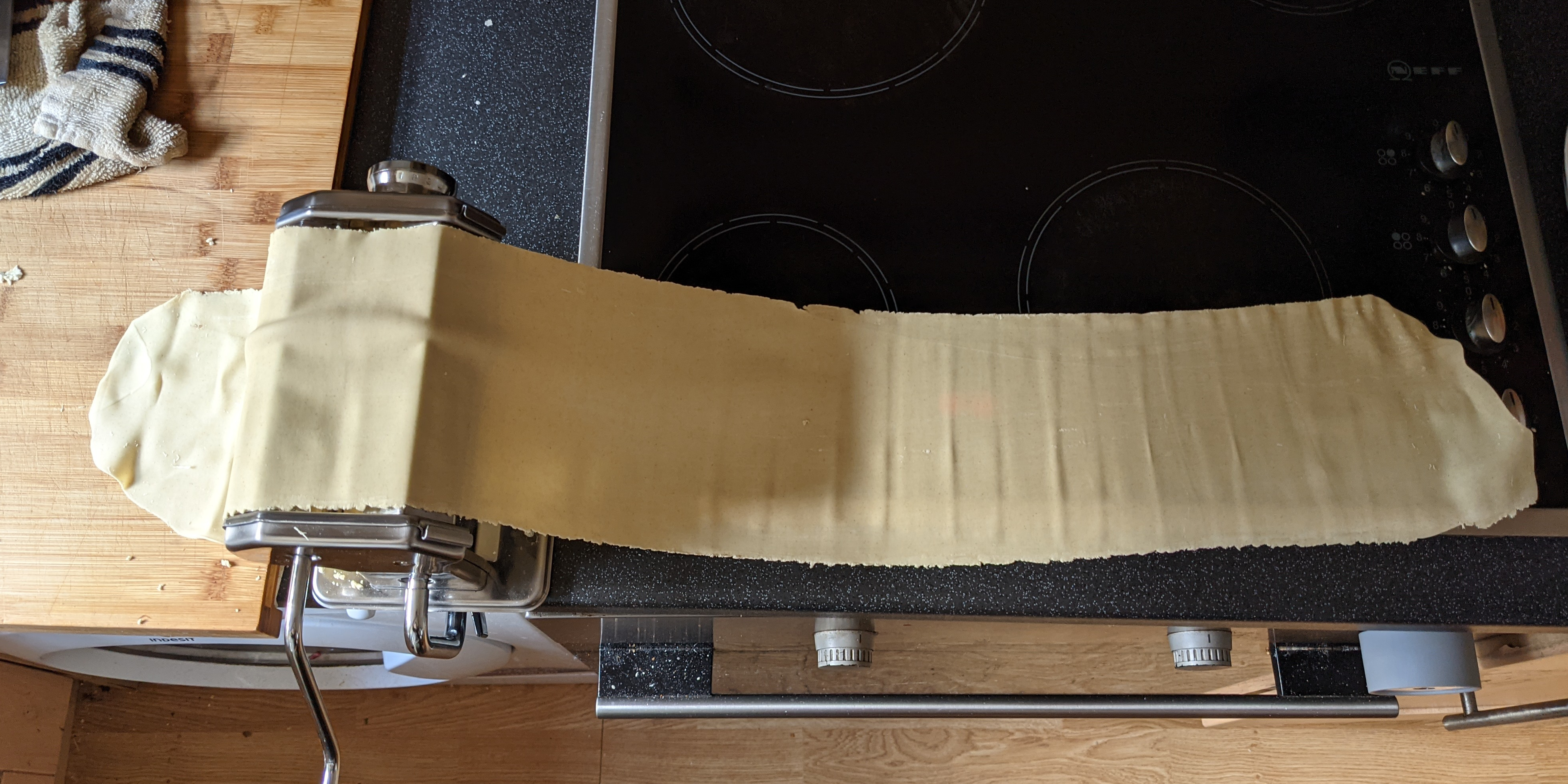 A long thin sheet of dough around a meter in length