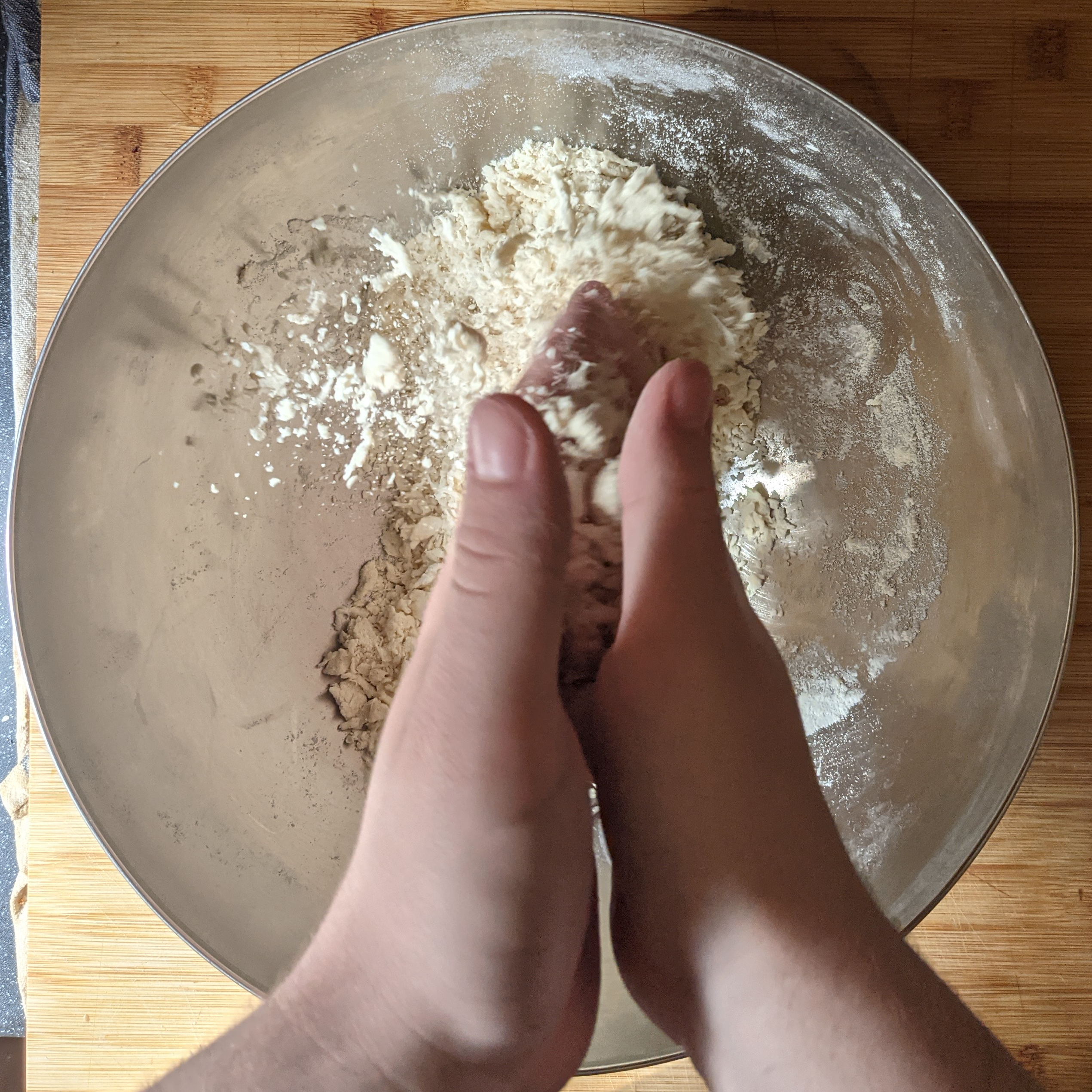 Rubbing flour with hands